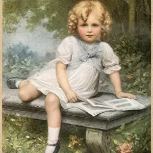 A young girl with blonde curls sits with her picture book on a stone bench in a woodland