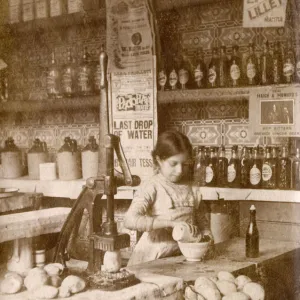 Young girl preparing chips - Fish & Chip Shop, Morecambe