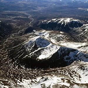 Aerial image of Scotland, UK: Cairn Toul (Hill of the barn) of The Cairngorms, the fourth highest mountain in Scotland, surpassed only by Ben Nevis, Ben Macdui and Braeriach. It towers above the western side pass of the Lairig Ghru
