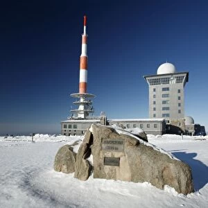 Weather Station and Transmitter Mast on Brocken summit in winter landscape covered with snow - National Park Harz Mountains - Sachsen-Anhalt - Germany