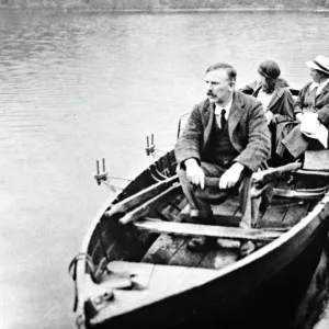 E. Rutherford with his wife and daughter in a boat