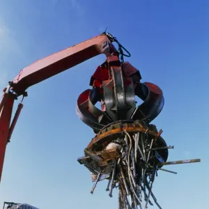 Large electromagnet in use at a scrapyard