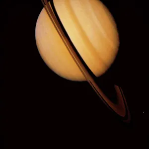 Voyager 1 image of Saturn & three of its moons