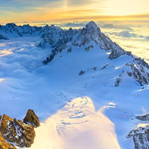 Aerial view of the Grand Jorasses at sunrise, Mont Blanc massif, Courmayeur, Aosta Valley