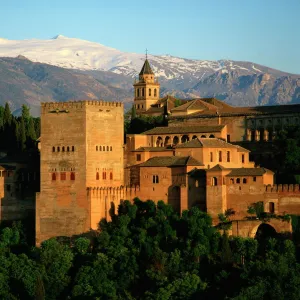 The Alhambra Palace, UNESCO World Heritage Site, with the snow covered Sierra Nevada mountains in the background, Granada, Andalucia