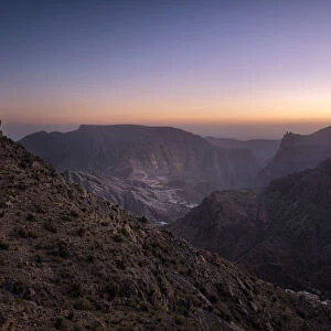 Blue hour on the rocky landscape of Jebel Akhdar mountains in Oman, Middle East