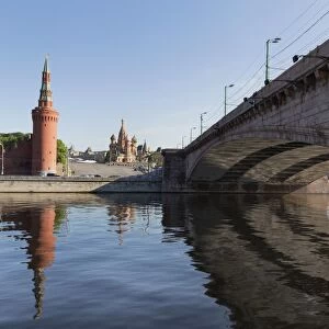 Bridge over the River Moskva with the Kremlin and St. Basils Cathedral in the distance, Moscow, Russia, Europe