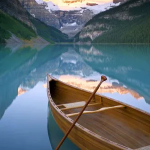 Canoe on Lake Louise at Sunrise, Lake Louise, Banff National Park, Alberta, Canada