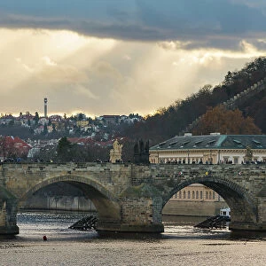 Charles Bridge against dramatic sky, UNESCO World Heritage Site, Prague, Bohemia, Czech Republic (Czechia), Europe