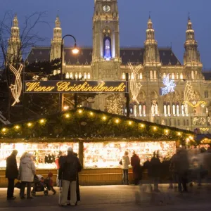 Christkindlmarkt (Christmas Market) and Rathaus (Town Hall) at Rathausplatz at twilight