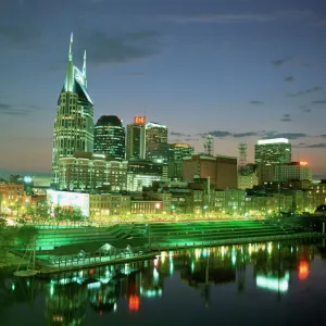 City skyline and Cumberland river at dusk