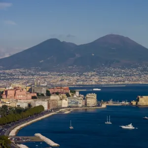 Cityscape including Castel dell Ovo and Mount Vesuvius, Naples, Campania, Italy, Europe