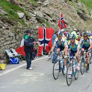 Cyclists including Lance Armstrong and yellow jersey Alberto Contador in the Tour de France 2009