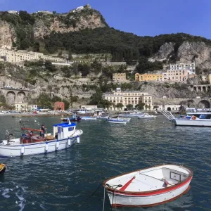 Fishing boats in Amalfi harbour, cliffs and hills, Costiera Amalfitana (Amalfi Coast)