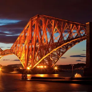 Forth Rail Bridge over the River Forth illuminated at night, South Queensferry, Edinburgh, Midlothian, Scotland, United Kingdom, Europe