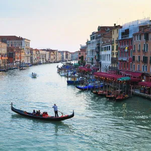 A gondola crossing the Grand Canal, Venice, UNESCO World Heritage Site