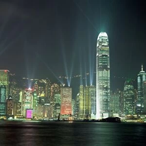 Hong Kong city skyline looking across Victoria harbour to Hong Kong Island at night