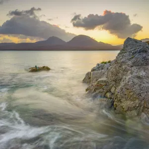 Isle of Jura and Paps of Jura Mountains across Bunnahabhain Bay and Sound of Islay from Islay, Argyll and Bute, Scotland, United Kingdom, Europe