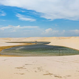Lake in the sand dunes of Lencois Maranhenses National Park, Maranhao, Brazil, South America