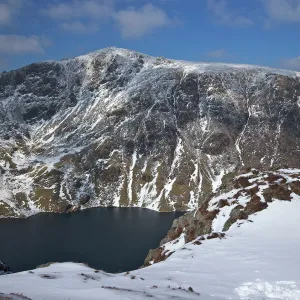 Llyn Cau and summit of Cader Idris in winter sun, Snowdonia National Park, Gwynedd, Wales, United Kingdom, Europe