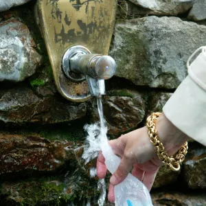 Lourdes holy water, Lourdes, Hautes Pyrenees, France, Europe