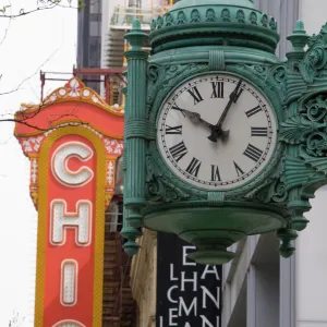 The Marshall Field Building Clock and Chicago Theatre behind, Chicago, Illinois