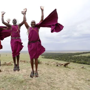 Masai warriors doing the traditional jump dance, Masai Mara Game Reserve, Kenya