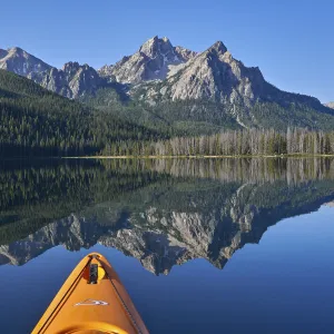 McGown Peak reflected in Stanley Lake while kayaking, Sawtooth National Recreation Area