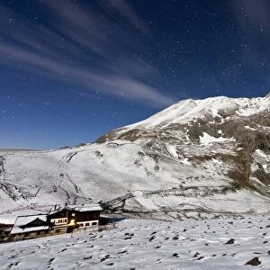 The mountain hut at the foot of Plattkofel (Sasso Piatto) under a starry winter night, South Tyrol, Trentino-Alto Adige, Italy, Europe