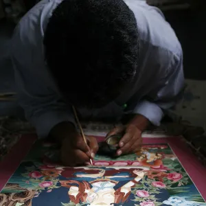 Painting a thangka depicting White Tara goddess, Buddhist symbol of long life, Bhaktapur