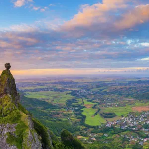 Panoramic of Le Pouce mountain and Pieter Both towards the Indian Ocean sunset, aerial