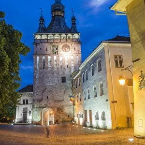 Sighisoara Clock Tower at night in the historic centre of Sighisoara, a 12th century Saxon town