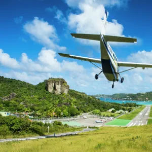 Small airplane landing at the airport of St. Barth (Saint Barthelemy), Lesser Antilles