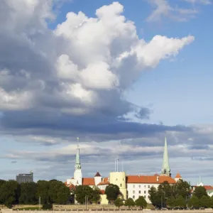 Speedboat on Daugava River with Riga Castle in background, Riga, Latvia