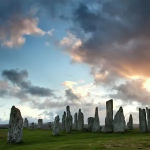 Standing Stones of Callanish at sunset with dramatic sky in the background, near Carloway, Isle of Lewis, Outer Hebrides, Scotland, United Kingdom, Europe