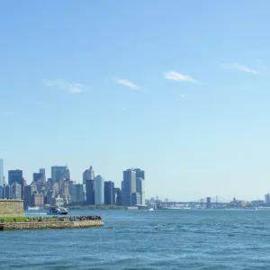 Statue of Liberty and Liberty Island with Manhattan skyline in view, New York City, New York, United States of America, North America