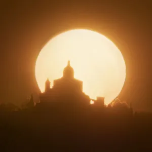 Sun behind the silhouette of San Luca Sanctuary during sunset, Bologna, Emilia Romagna, Italy, Europe