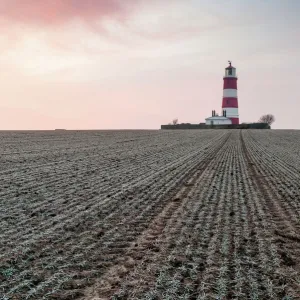 Sunrise at Happisburgh Lighthouse on a frosty morning, Happisburgh, Norfolk, England