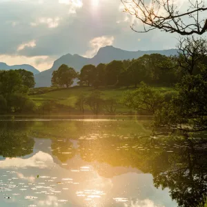 Sunset at Loughrigg Tarn near Ambleside in The Lake District National Park, Cumbria