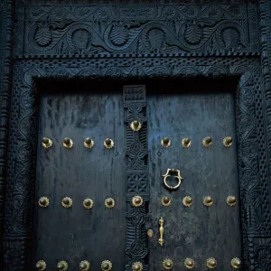 Traditional carved wooden door in Stone Town, Zanzibar, Tanzania, East Africa, Africa