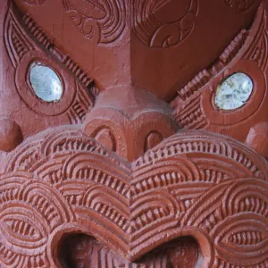 Traditional wood carved mask in the Te Puia Maori Cultural Center, Rotorura, North Island, New Zealand, Pacific