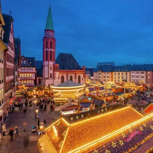 View of carousel and Christmas Market stalls at dusk, Roemerberg Square, Frankfurt am Main, Hesse, Germany, Europe