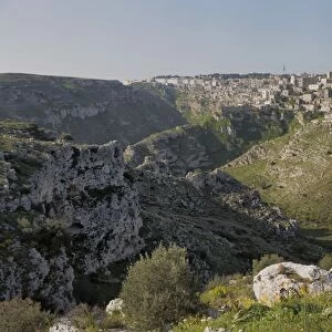 View of the ravine and the Sassi area of Matera with Matera Cathedral, Basilicata, Italy, Europe