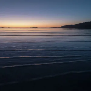 Winter sunrise at high tide, Traigh Mhor, the beach used as Barra Airport at low tide