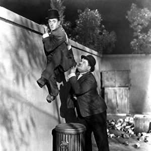 Stan Laurel and Oliver Hardy in James Parrotts Night Owls (1930)