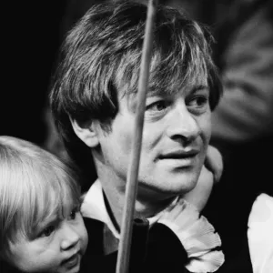 Alex Higgins with his daughter at the 1983 World Snooker Championships