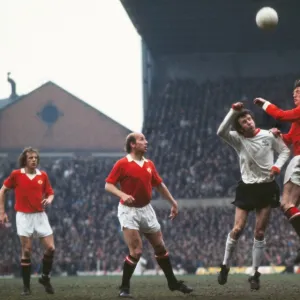 Arnie Sidebottom and Bill Dearden jump for the ball at Old Trafford in 1973