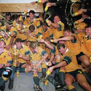 The Australia team celebrate after winning the 1999 Rugby World Cup