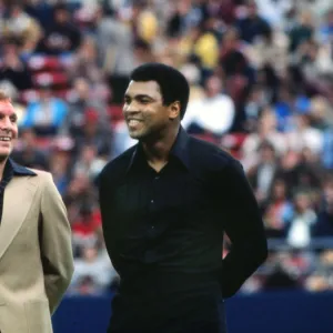 Bobby Moore and Muhammad Ali share a joke at Peles farewell game