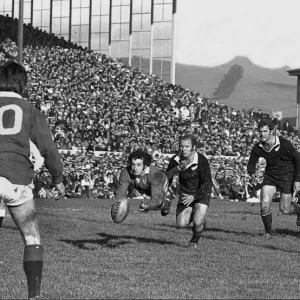 Gareth Edwards passes to Barry John during the second Lions test against the All Blacks in 1971